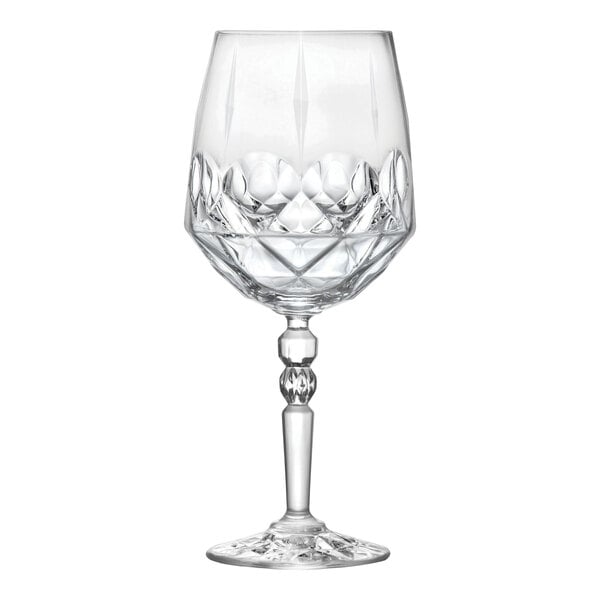 A clear, faceted crystal goblet with a decorative stem and a 22.5 oz. capacity.
