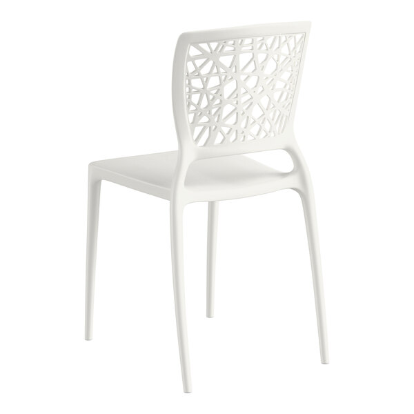 A white resin side chair with a webbed back design.