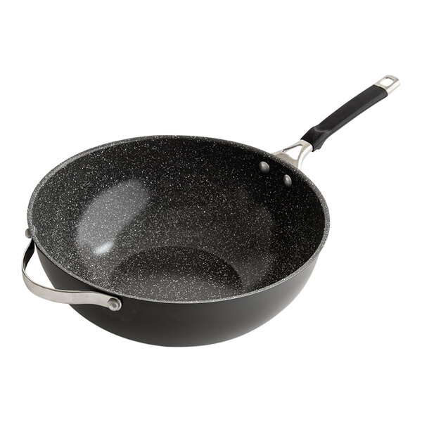 A black and grey speckled Nordic Ware stir fry pan.