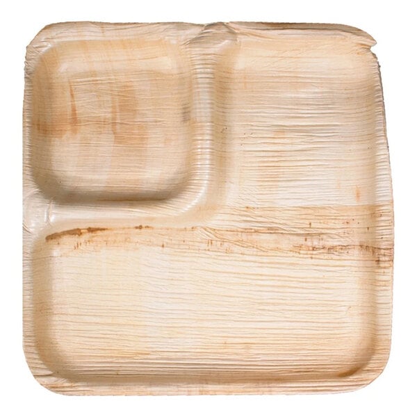 A VerTerra palm leaf plate with two compartments.