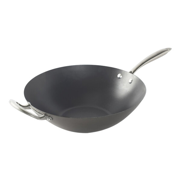 A black Nordic Ware wok with a handle.