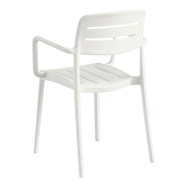 A white resin arm chair with a slatted back and seat design.