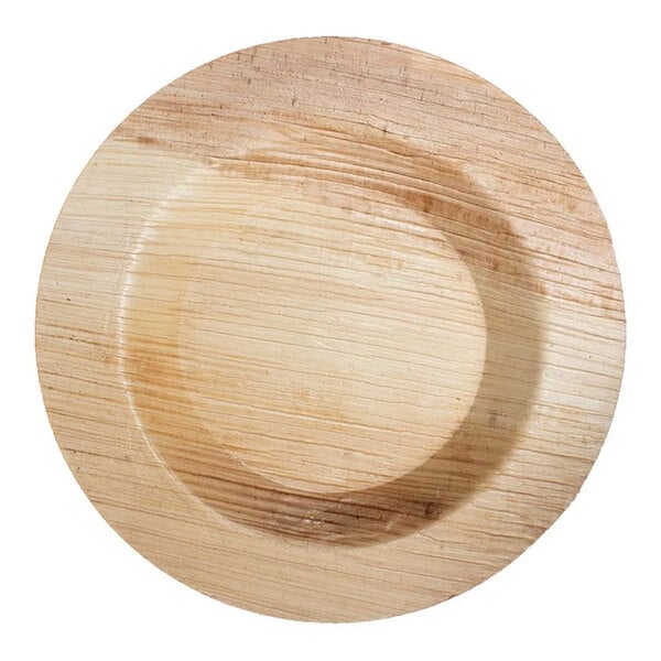 A VerTerra round palm leaf plate with a wide rim.