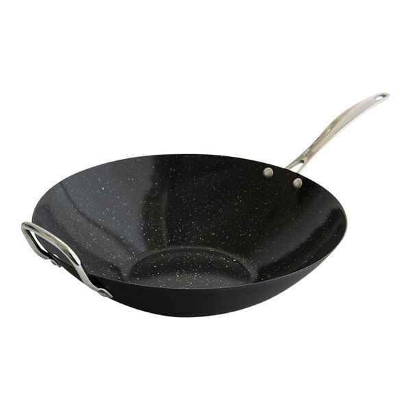 A black wok with a silver handle.