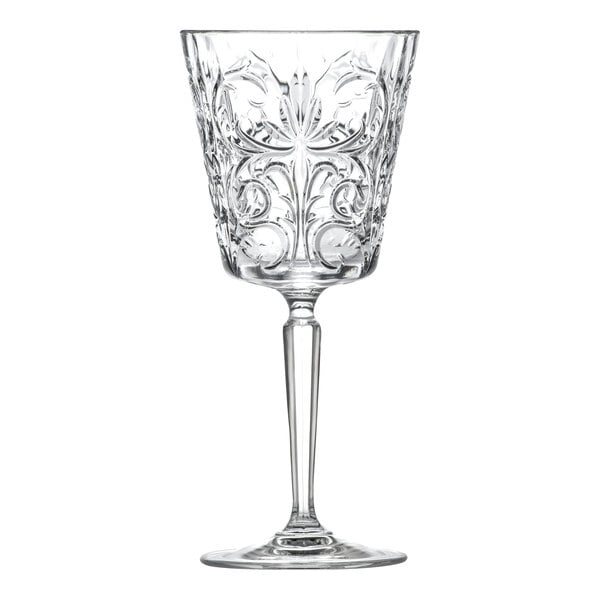 A clear, intricately patterned wine glass with a long stem and a 9.75 oz. capacity.