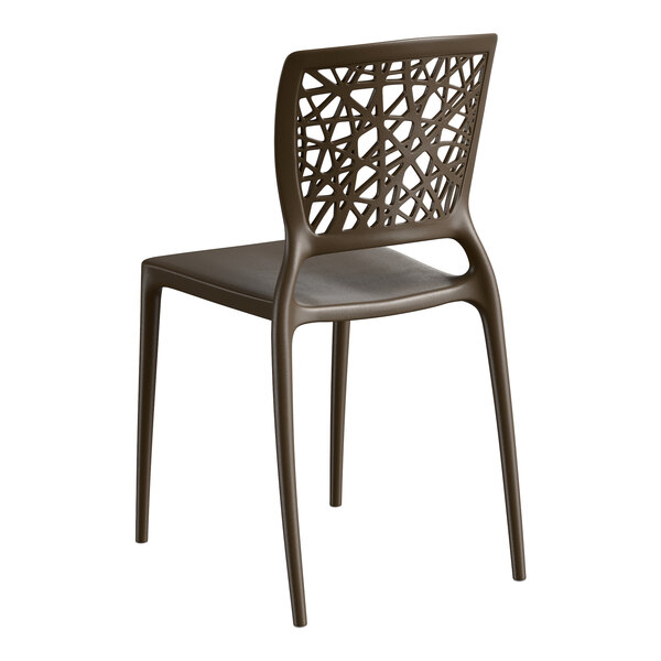 A brown resin side chair with a webbed back design.