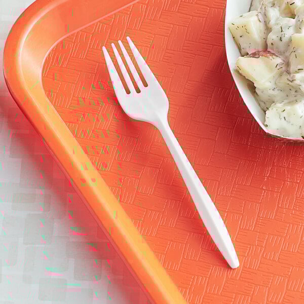 A white plastic fork on a tray.