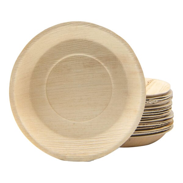 A stack of VerTerra palm leaf plates on a white background.