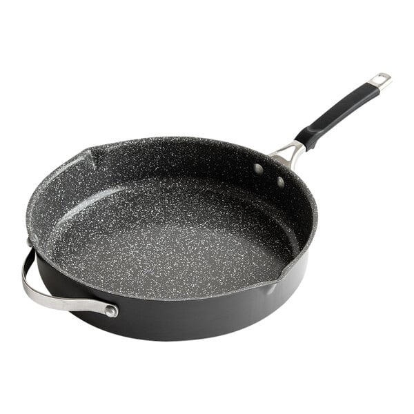 A black and silver Nordic Ware saute pan with a handle.