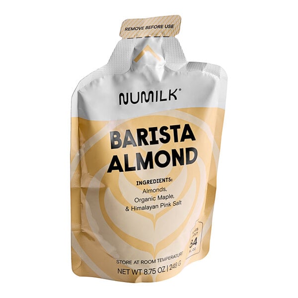 A white bag of Numilk Barista Almond Milk Concentrate with yellow and black text.
