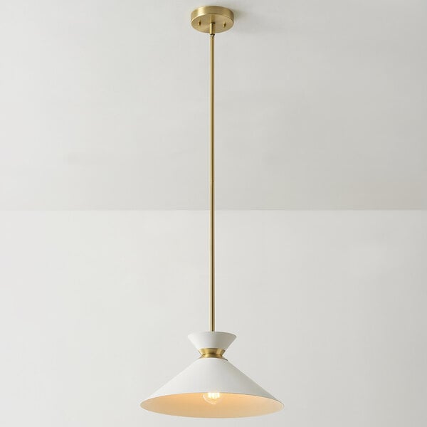 A single pendant light with a matte brass finish, a white tapered shade, and an adjustable hanging height.
