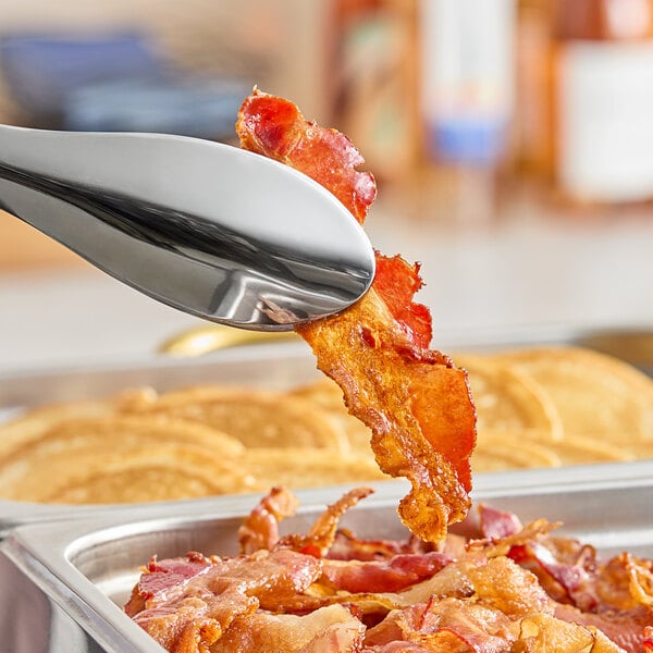 Lifting Hatfield Chef Choice Buffet Lay Flat Sliced Bacon with a spoon.