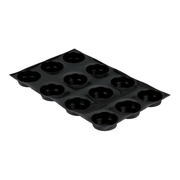 A black Sasa Demarle Flexipan tartlet mold with twelve small rectangular cavities.