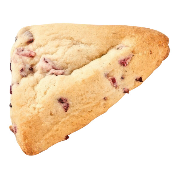 A piece of Pillsbury cranberry orange scone with a piece of chocolate on it.