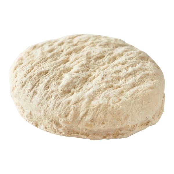 A round white piece of Pillsbury Southern Style biscuit dough with a textured surface.