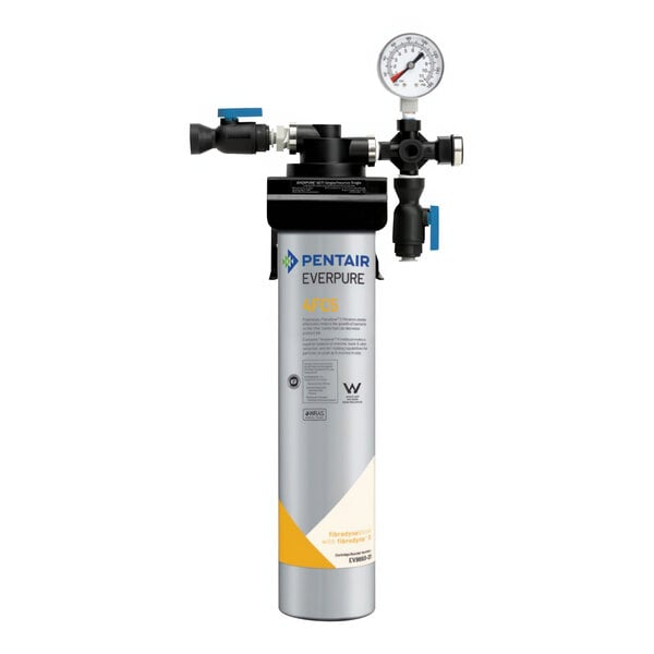 An Everpure water filtration system with a gauge on a grey cylinder.