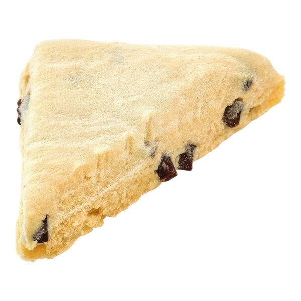 A scone with chocolate chips on a white surface.