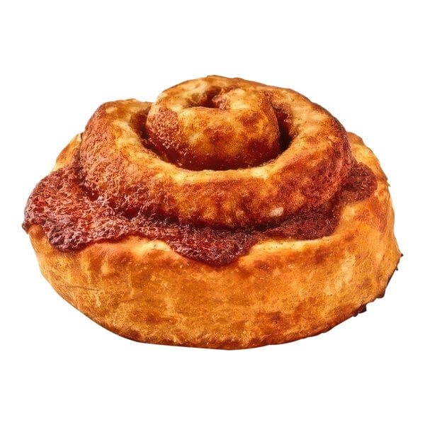 A Pillsbury preformed caramel twirl pastry on a white background.