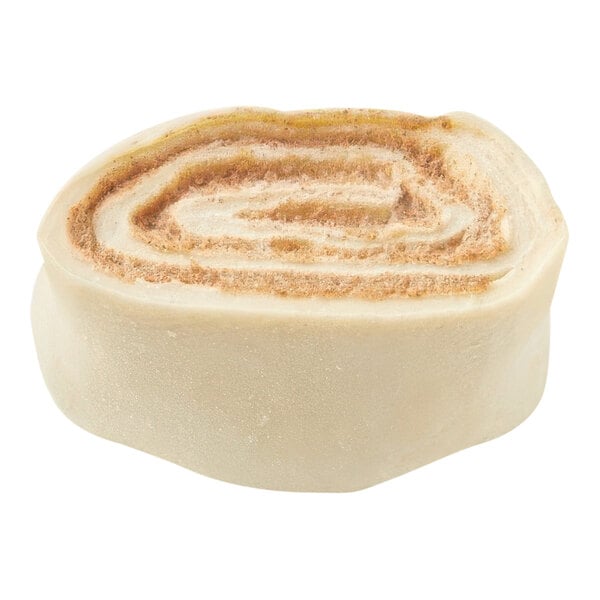 A roll of Pillsbury Best Frozen Cinnamon Roll dough with a brown and white swirl.