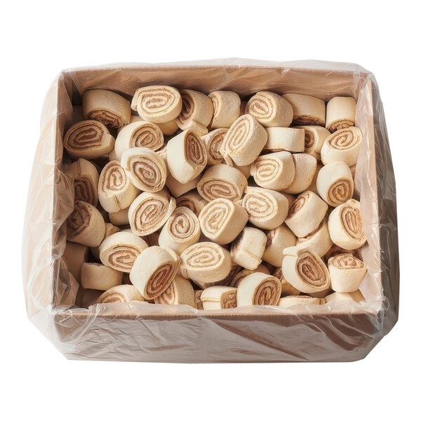 A box of Pillsbury Best Frozen Cinnamon Roll Dough with rolls in a plastic bag.