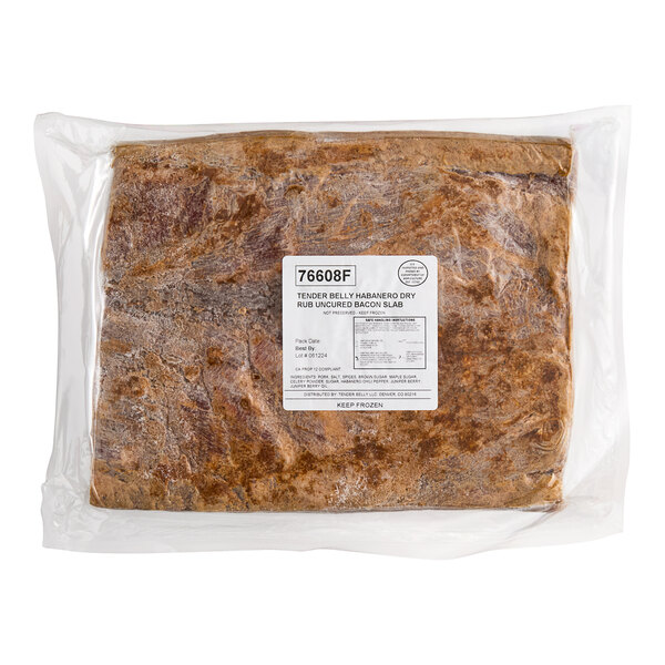 A plastic-wrapped Tender Belly Habanero Dry Rub Uncured Whole Pork Belly Bacon slab.