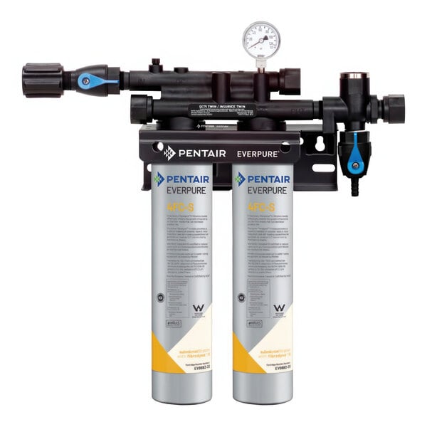 An Everpure water filtration system with two white cylinders and a black device with white text.