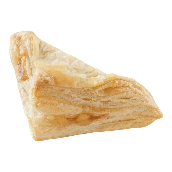 A close up of a turnover pastry on a white background.