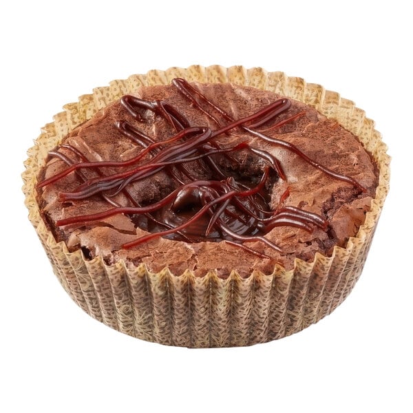 A brown cake with chocolate frosting in a Pillsbury single serve cup.