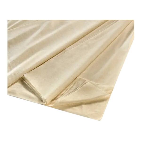 A close-up of a folded white fabric sheet.