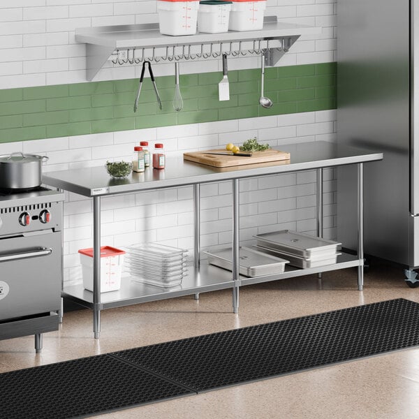 A stainless steel commercial work table with an undershelf, measuring 24 inches by 84 inches.