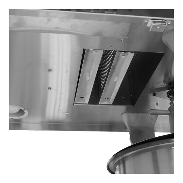 A close-up of a Paragon Zenith countertop popcorn machine with a metal bowl.