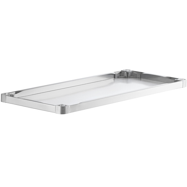 A rectangular stainless steel adjustable undershelf designed for 24" x 48" work tables.