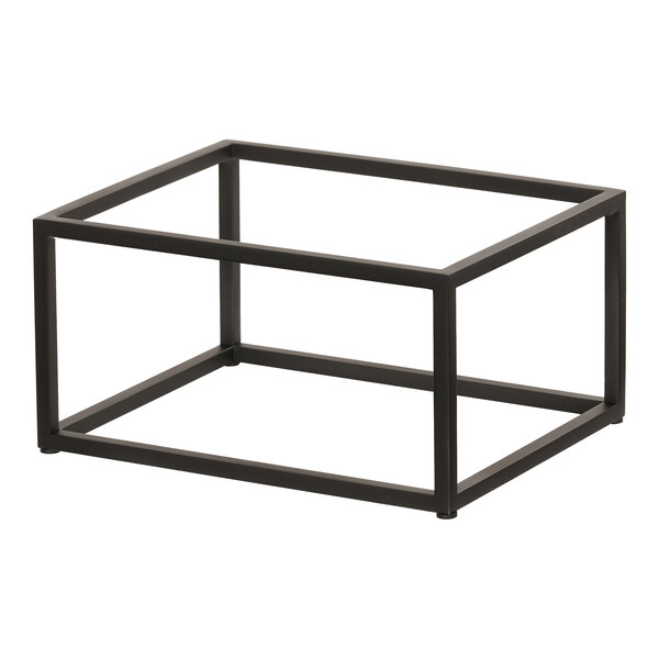 A black metal rectangular display riser on a table.