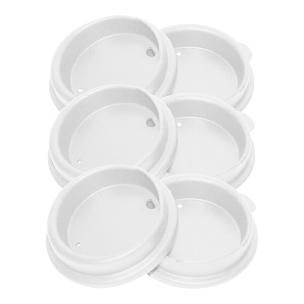 A group of white Richardson Products Inc. polypropylene tumbler lids.