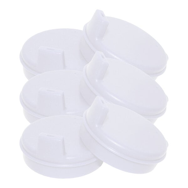 A group of 6 white plastic cup lids.