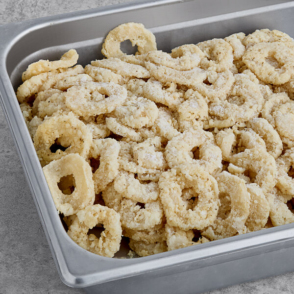 Jinka Plant-Based breaded calamari in a pan.
