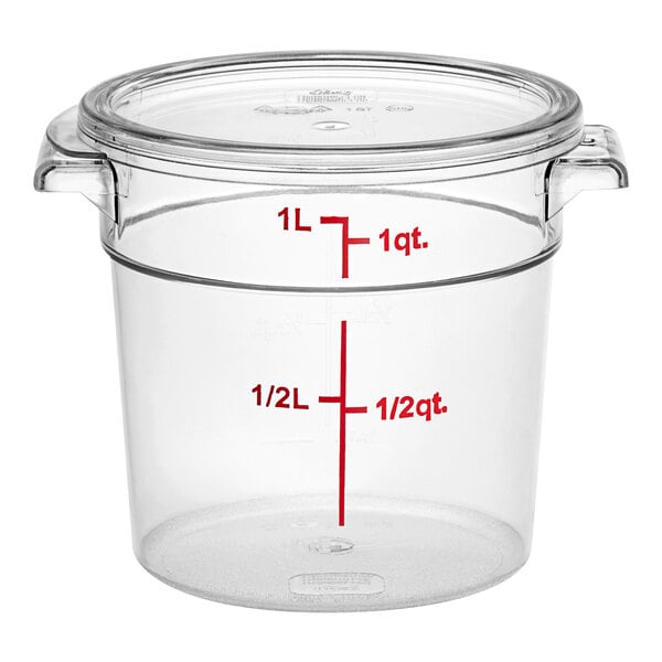 A clear round polycarbonate food storage container with a lid and red measurement markings.