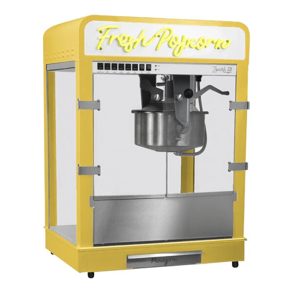 A yellow Paragon Zenith countertop popcorn machine with a silver lid.