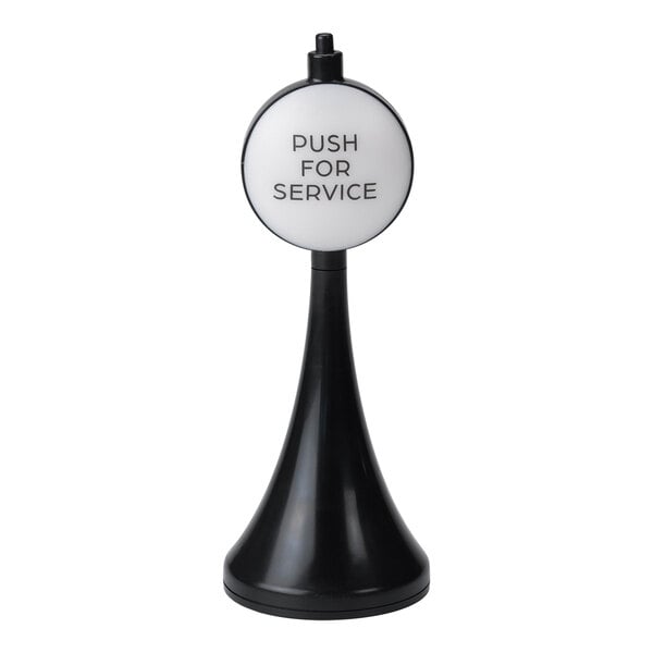 A black and white plastic push button service sign.
