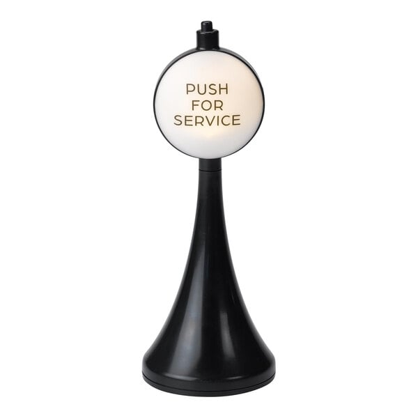A black and white plastic "Push for Service" tabletop sign stand.