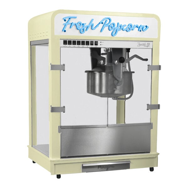 A Paragon cream countertop popcorn machine with a large container on top.