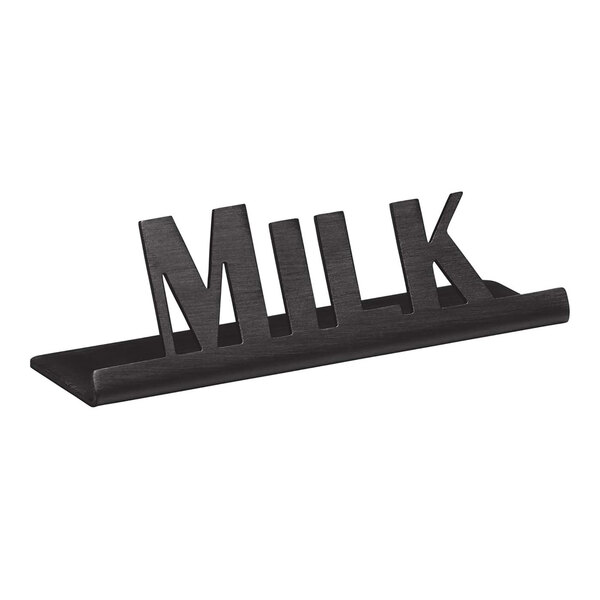 A black stainless steel "Milk" tabletop sign.