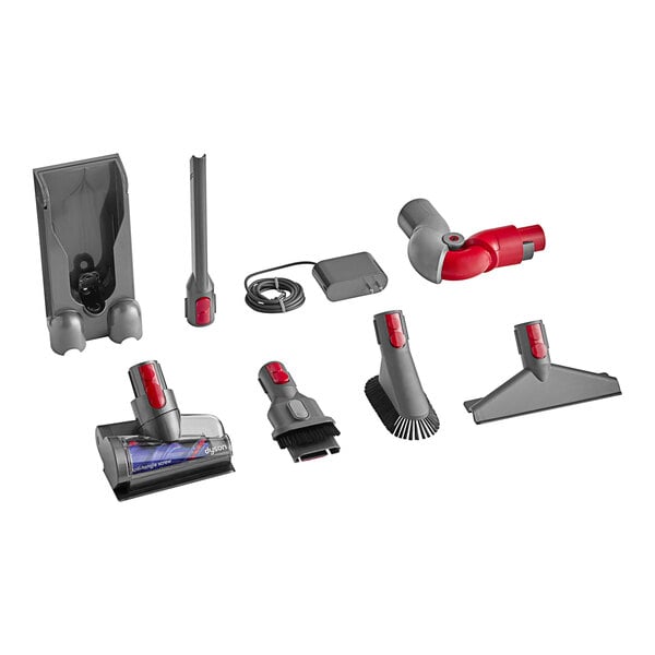 A close up of a Dyson V11 cordless stick vacuum cleaner with battery and charger attached.