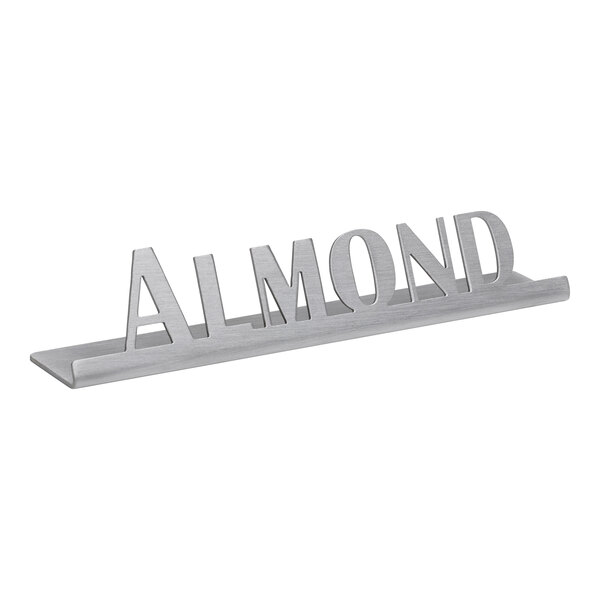 A brushed stainless steel tabletop sign with the word "Almond" on it.