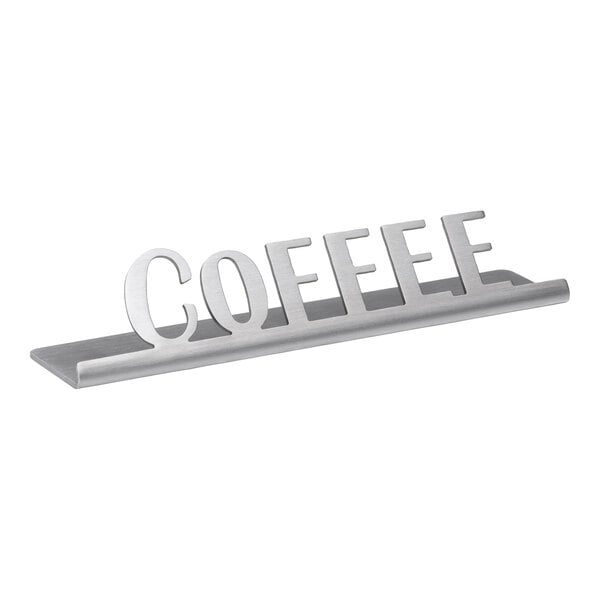 A brushed stainless steel tabletop sign with the word "Coffee" on it.