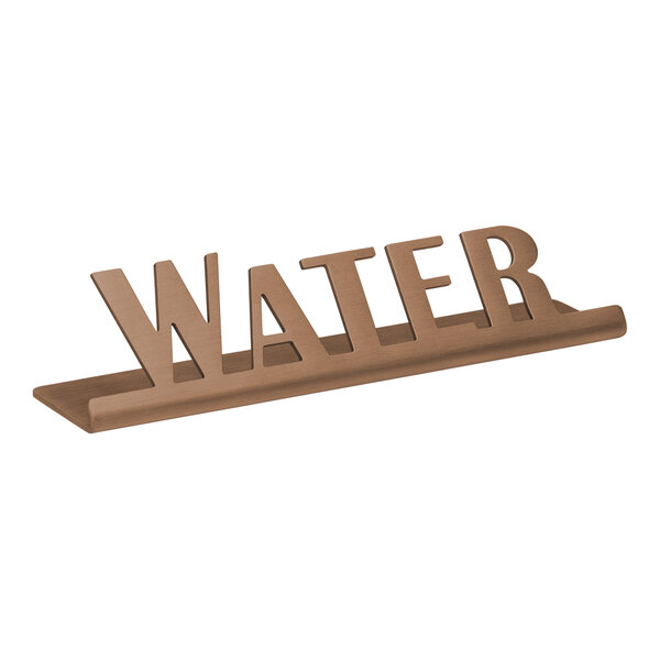 A rose gold stainless steel table tent with "water" in metal lettering.