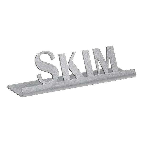 A silver brushed stainless steel tabletop sign that says "Skim" 