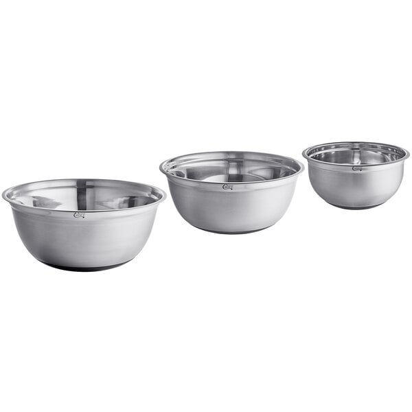 A set of three extra-large stainless steel mixing bowls with silicone bottoms.