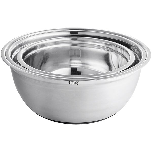 A set of three extra-large stainless steel mixing bowls with silicone bottoms, nested together.