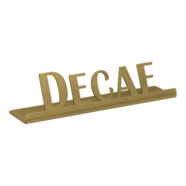 A vintage gold stainless steel table sign that says "Decaf"